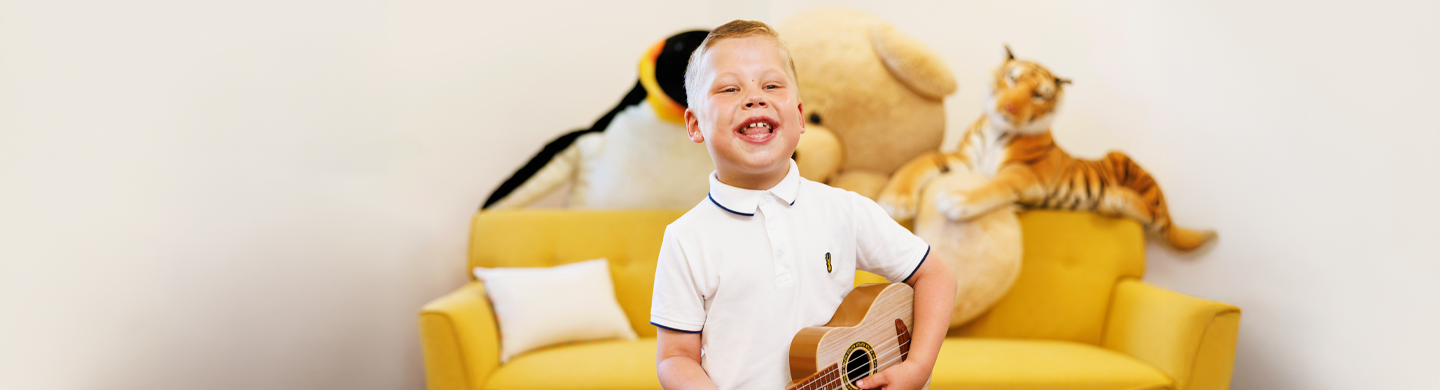 Kid playing guitar